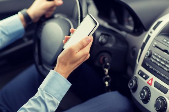 Looking for a car online using a phone while in a car